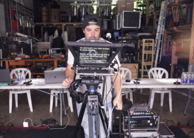 A man standing in front of a camera.